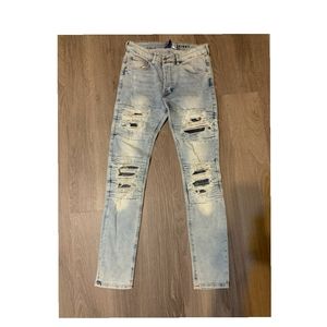 Distressed light wash denim